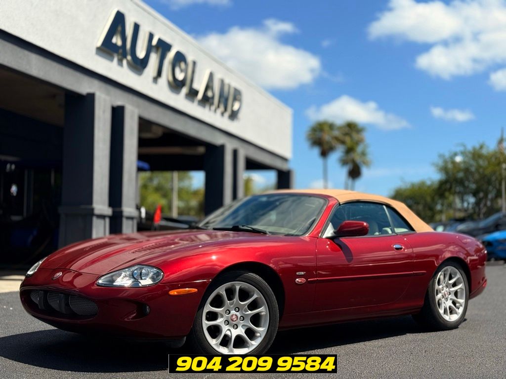 Carnival Red 1997 Jaguar XK-Series XK8 Coupe RWD Coupe Rear-Wheel Drive