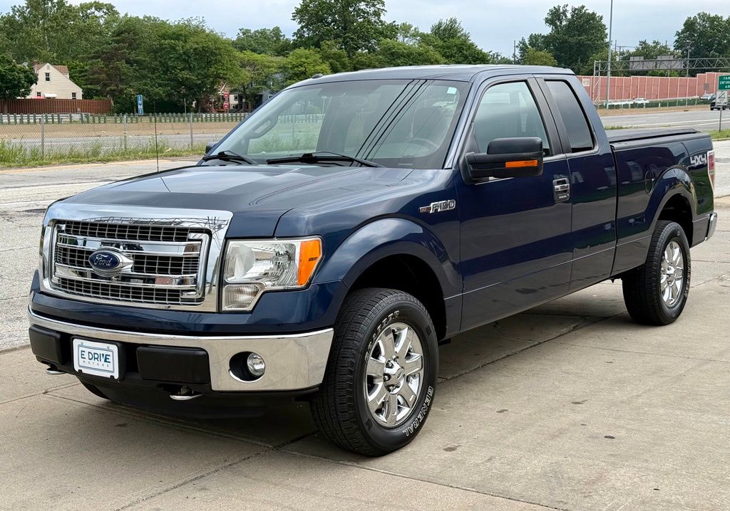 Blue 2014 Ford F-150 Pickup Truck Four-Wheel Drive 6-Speed Automatic