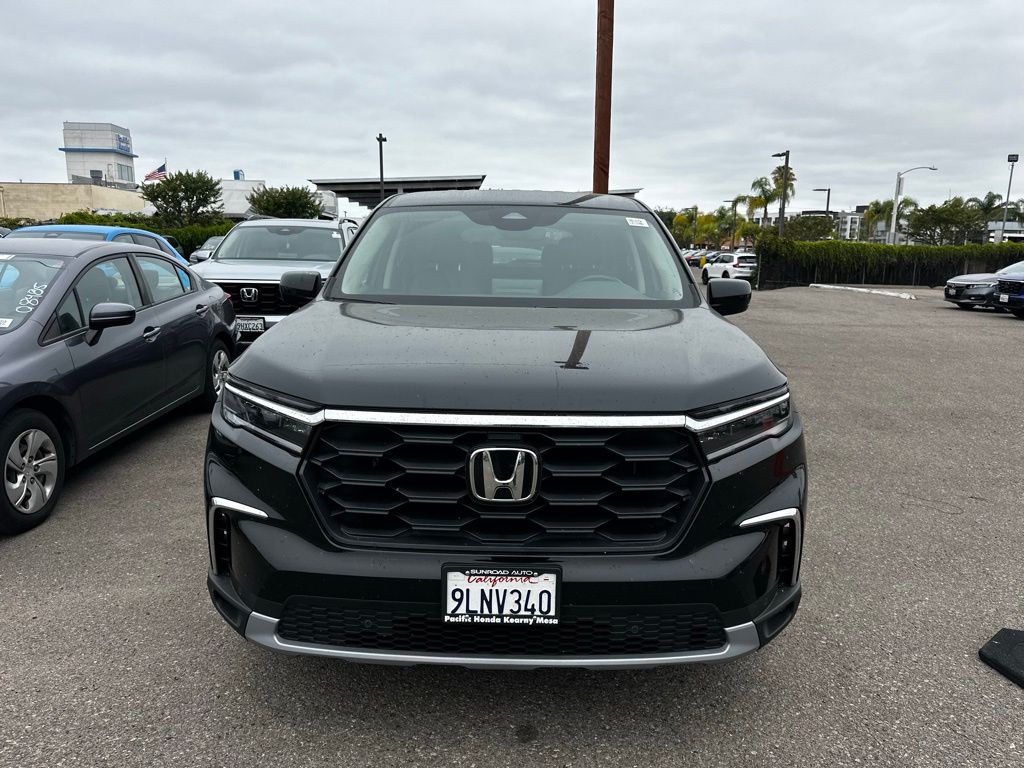 View vehicle photo 5