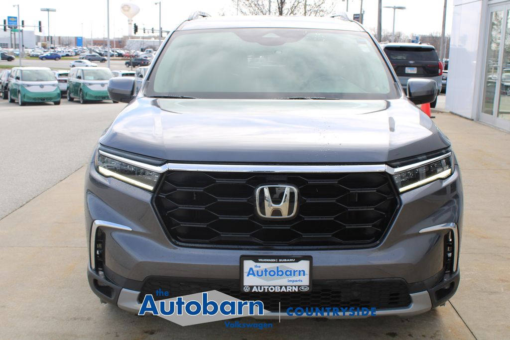 View vehicle photo 2