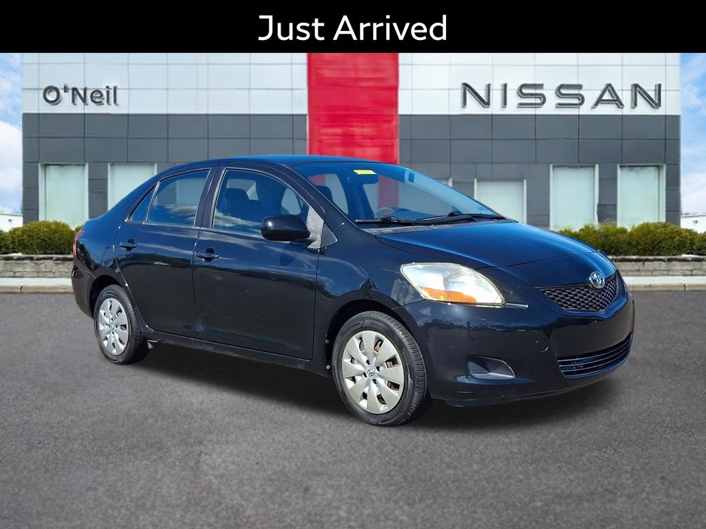 Black Sand Pearl 2010 Toyota Yaris Sedan Front-Wheel Drive 4-Speed Automatic