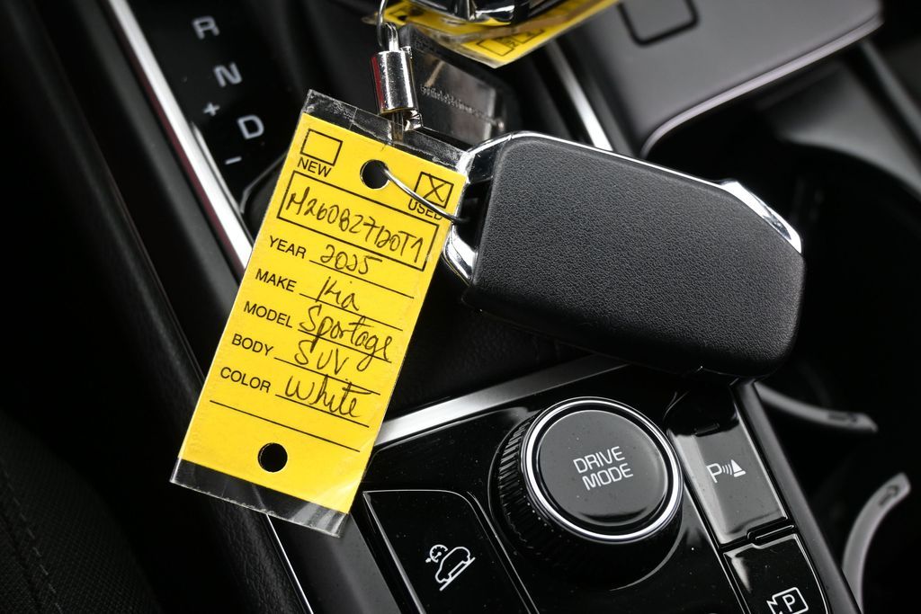 Used 2025 Snow White Pearl Kia LX image 27