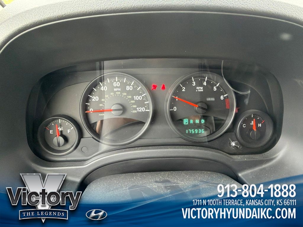 Used 2010 Red Jeep Sport image 13