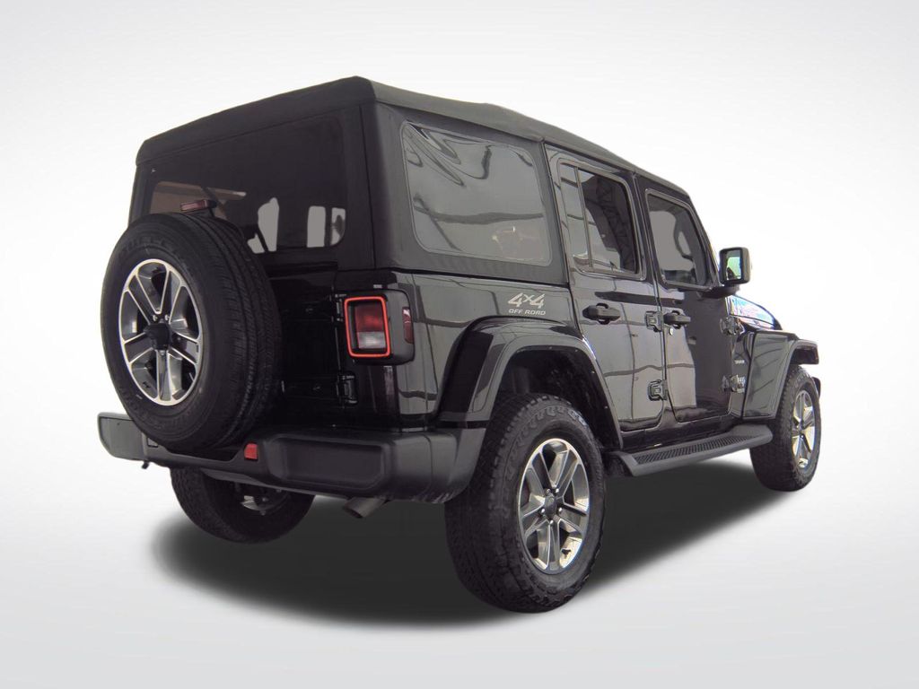 Used 2022 Black Jeep Unlimited Sahara image 4