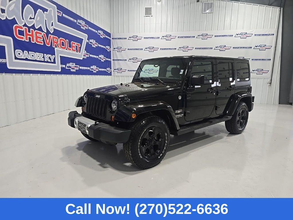 Black Clearcoat 2012 Jeep Wrangler Unlimited Sahara 4WD SUV / Crossover Four-Wheel Drive 5-Speed Automatic