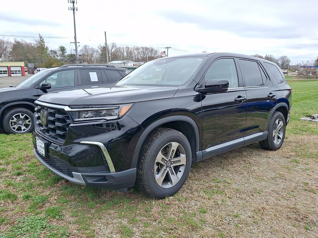 View vehicle photo 3