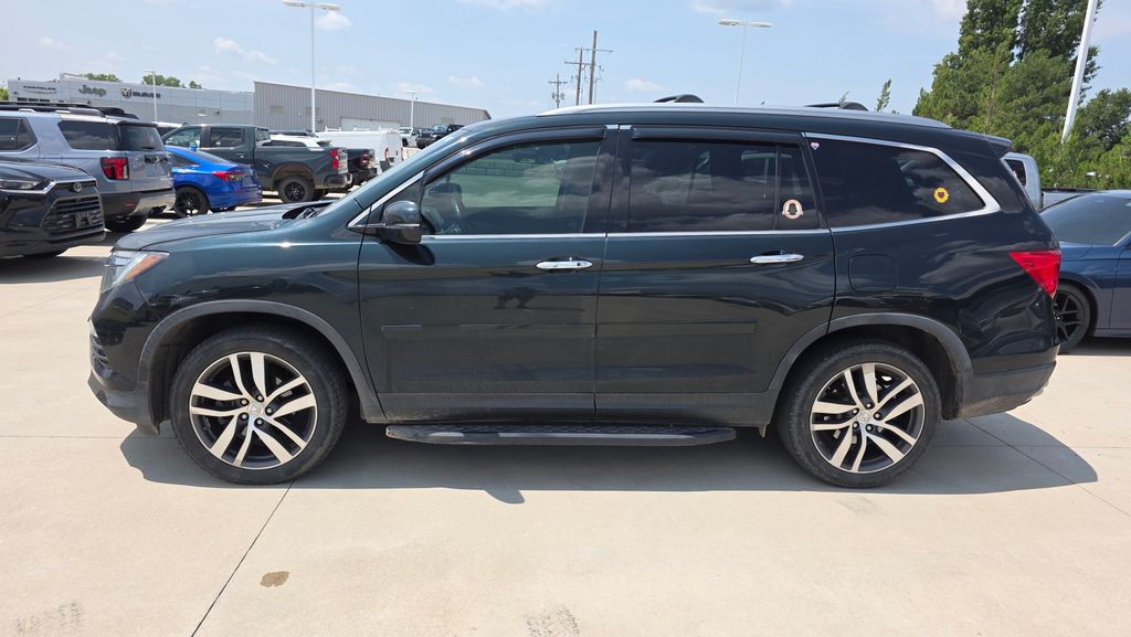 Used 2016 Honda Pilot Touring with VIN 5FNYF6H91GB090682 for sale in Kansas City