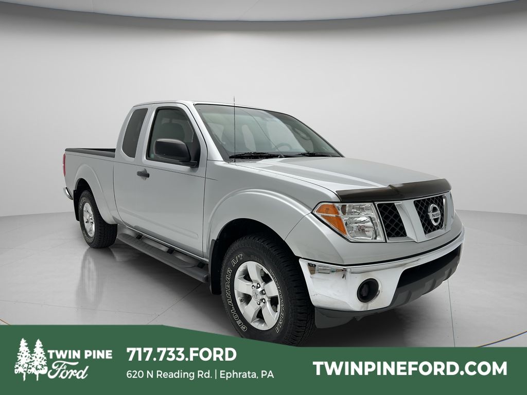 Radiant Silver 2007 Nissan Frontier SE King Cab 4WD Pickup Truck Four-Wheel Drive Manual