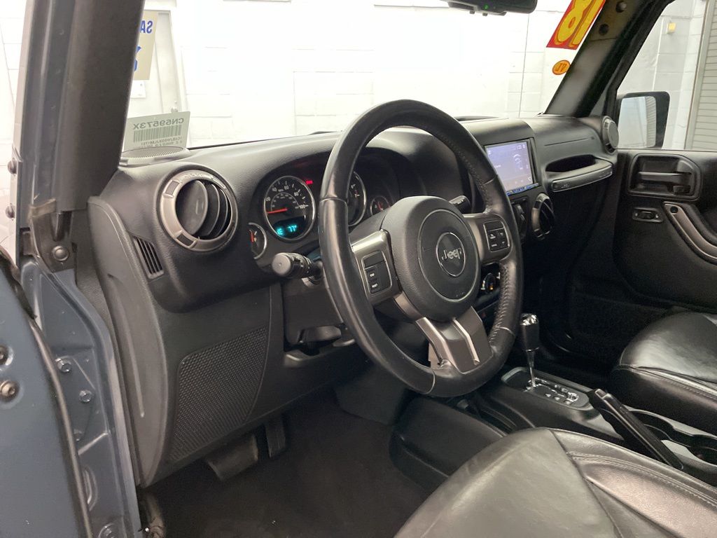 Used 2018 Black Jeep Unlimited Sahara image 18