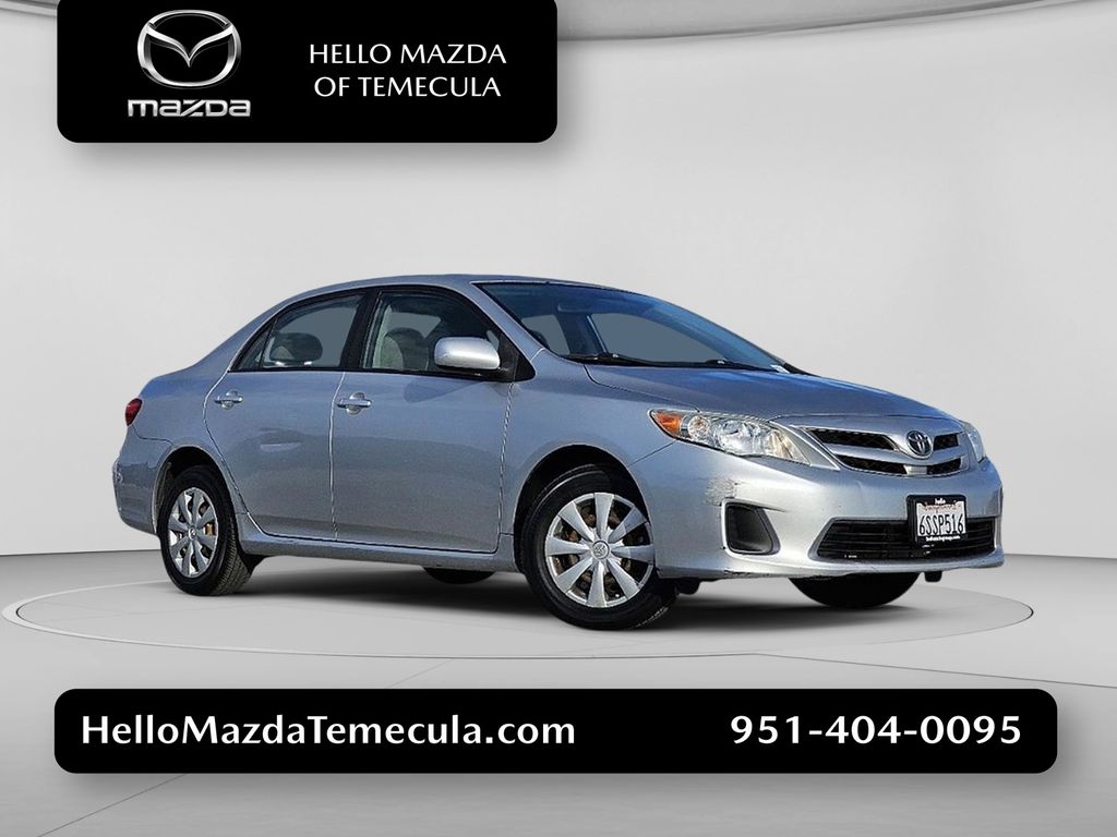 Classic Silver Metallic 2011 Toyota Corolla LE Sedan Front-Wheel Drive 4-Speed Automatic