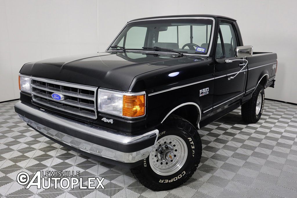 Black 1991 Ford F-150 Pickup Truck Four-Wheel Drive Automatic