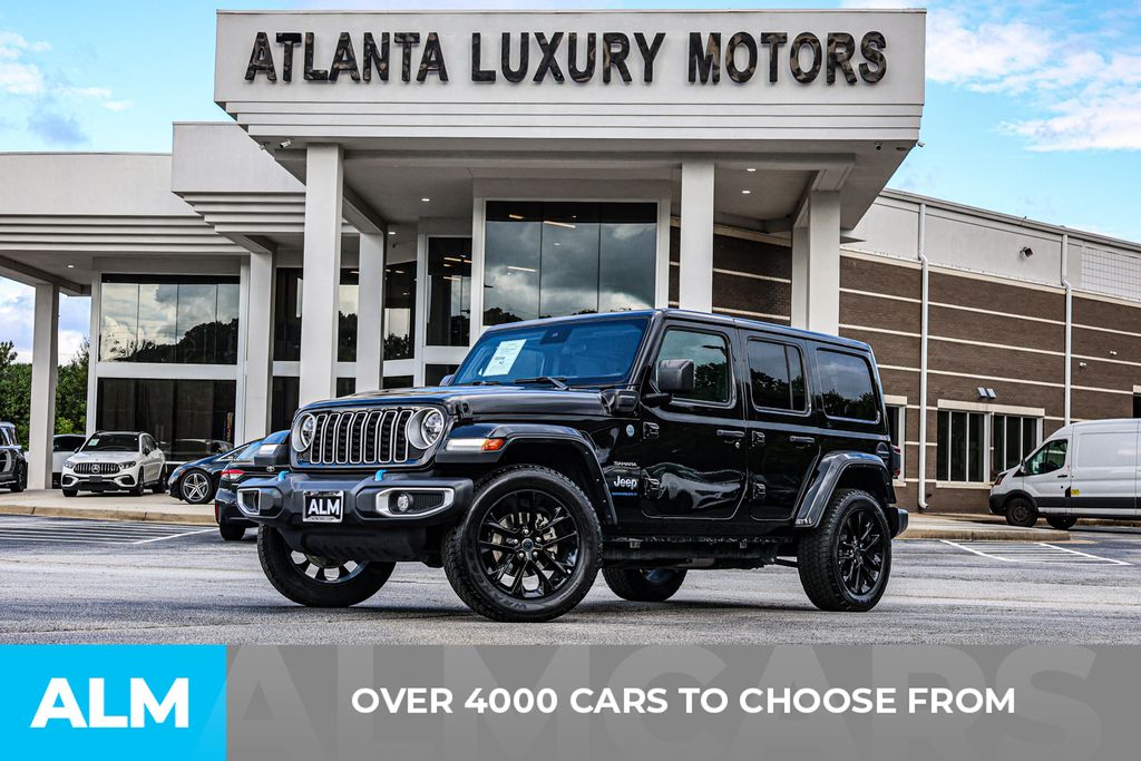 Used 2024 Black Jeep Sahara 4xe image 2