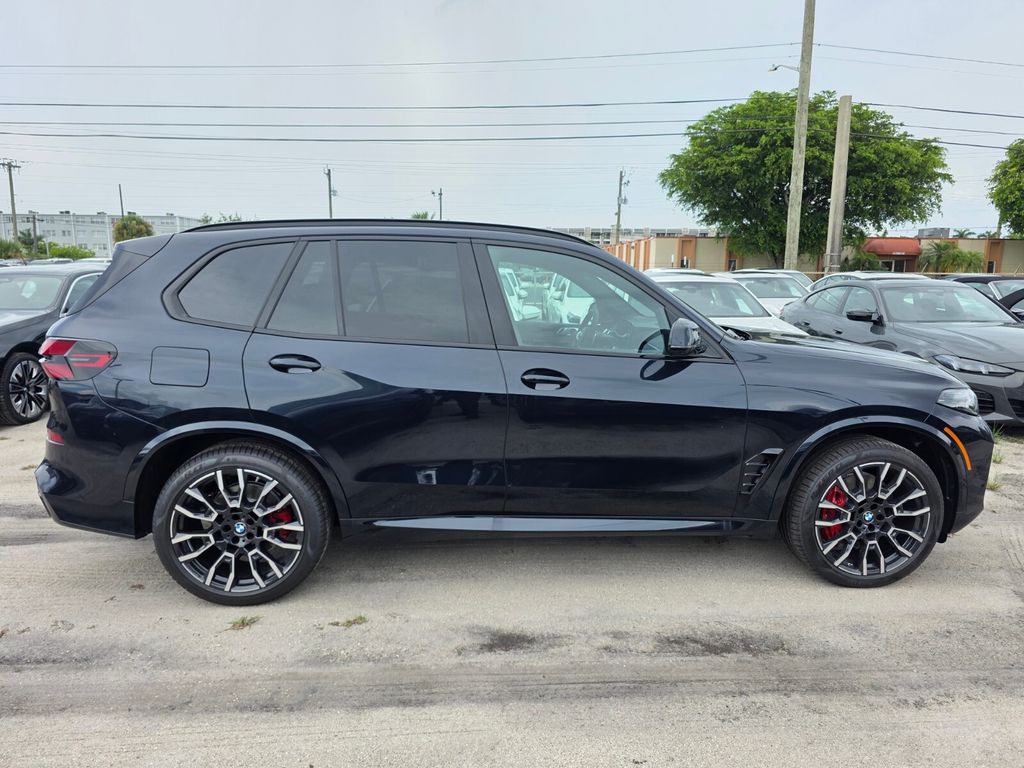 New 2026 Black BMW sDrive40i image 3