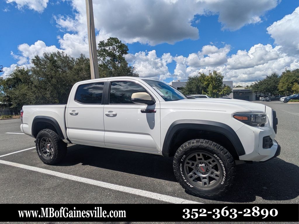 Super White 2019 Toyota Tacoma Pickup Truck Four-Wheel Drive 6-Speed Manual