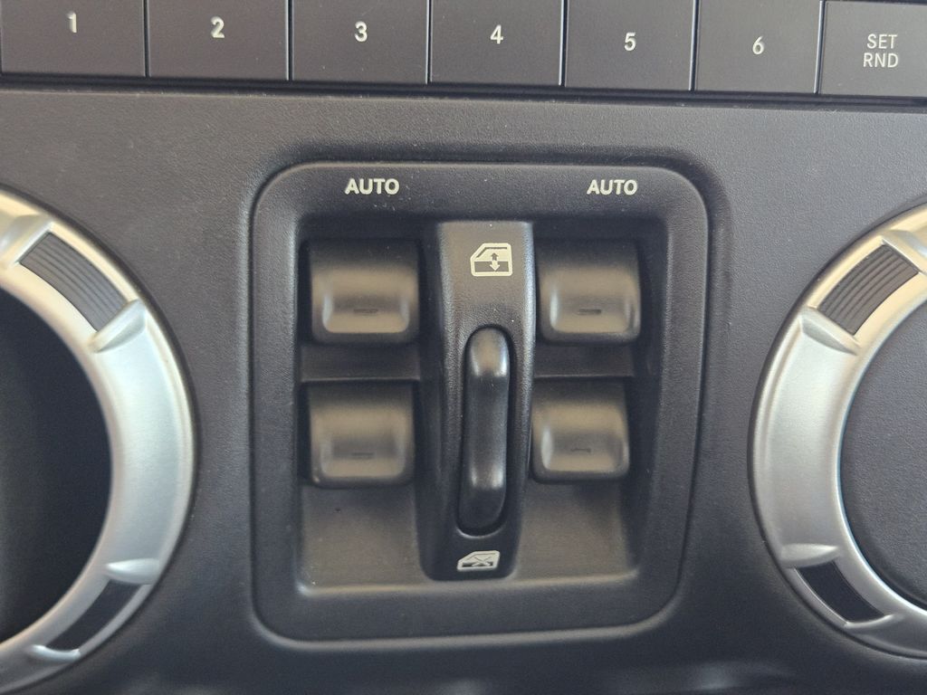 2015 Jeep Wrangler Unlimited Sahara White at DeMontrond Automotive Group