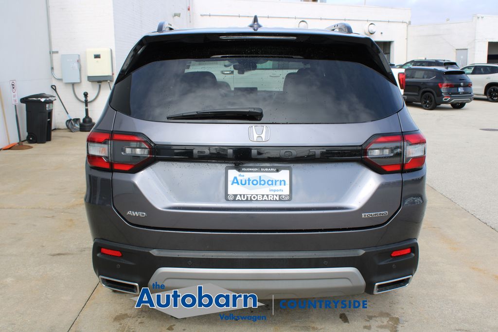 View vehicle photo 5