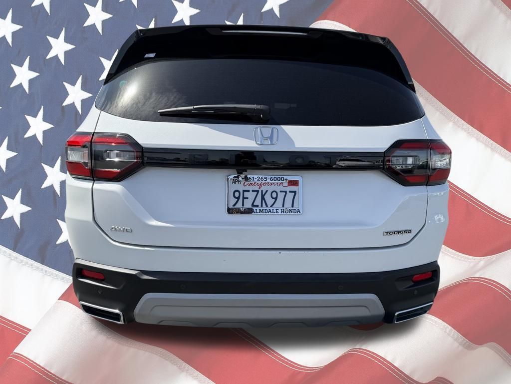 View vehicle photo 3