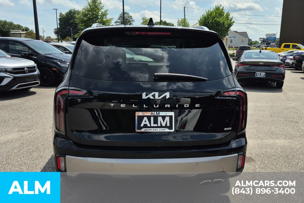 Used 2025 Ebony Black Kia SX-Prestige image 6
