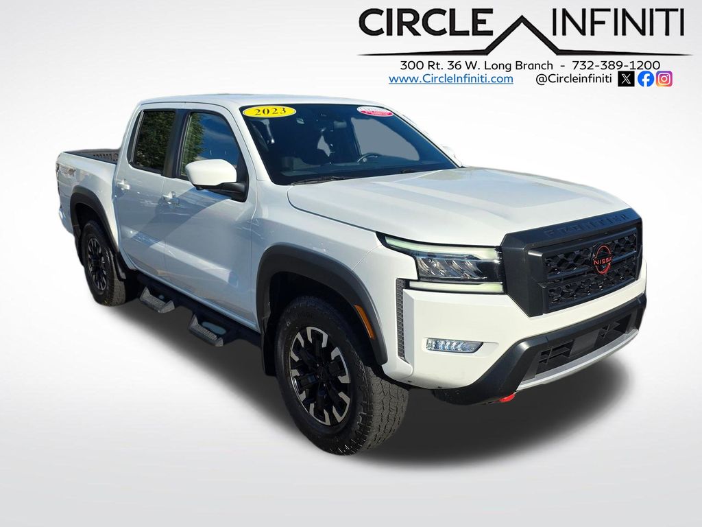 Glacier White 2023 Nissan Frontier Pickup Truck Four-Wheel Drive 9-Speed Automatic
