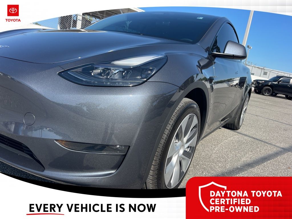 Used 2024 Tesla Model Y Long Range with VIN 7SAYGDEE4RA217818 for sale in Daytona Beach, FL