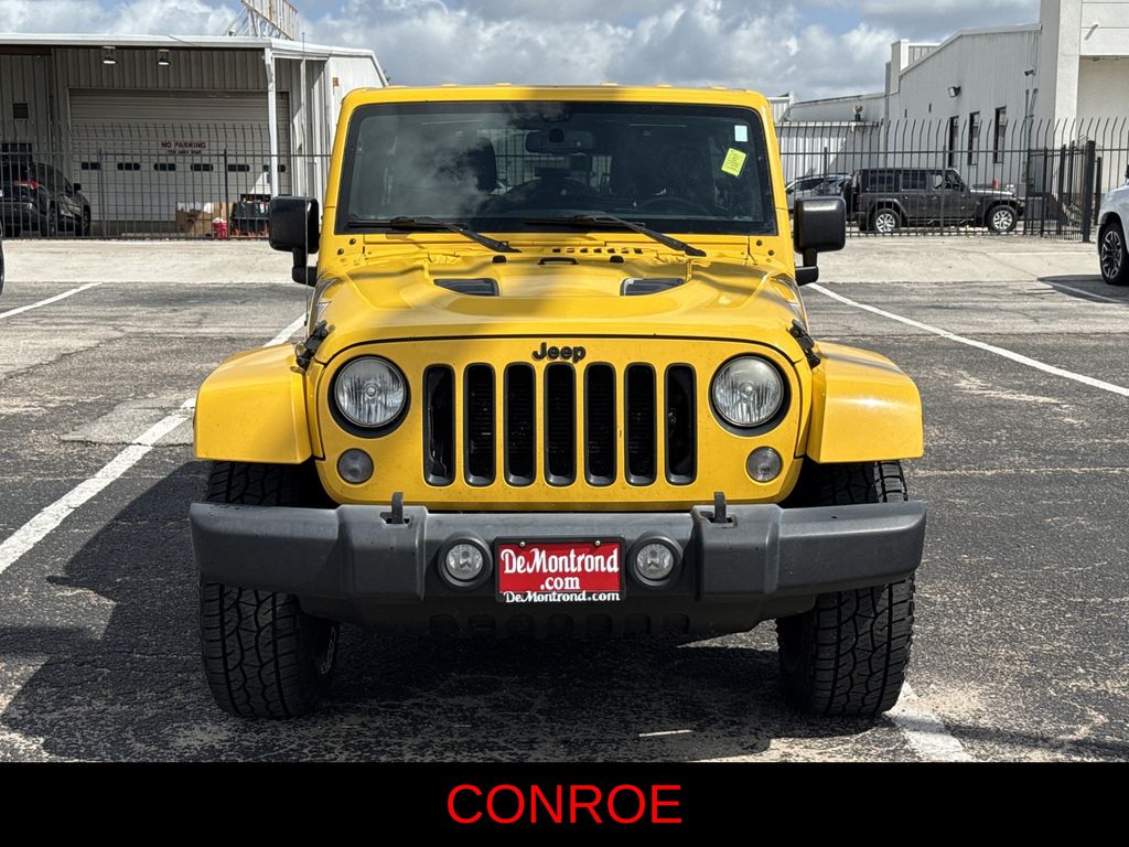 2015 Jeep Wrangler Unlimited Sahara Yellow at Bayshore Chrysler Jeep Dodge Ram