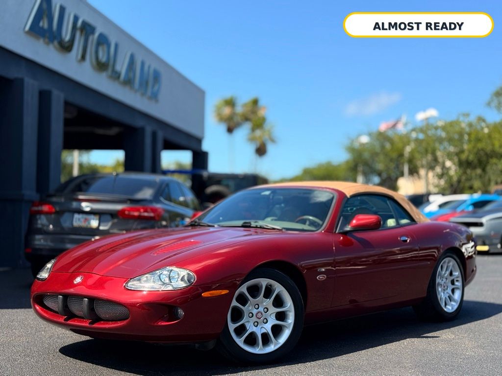 Carnival Red 1997 Jaguar XK-Series Coupe Rear-Wheel Drive
