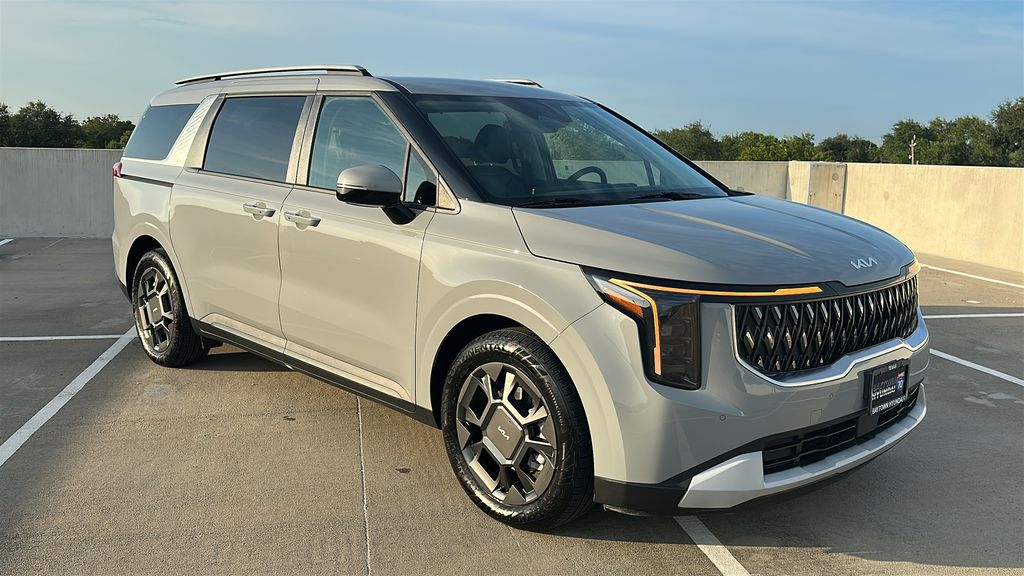 2026 Kia Carnival Hybrid EX White at Shottenkirk Kia Fort Bend