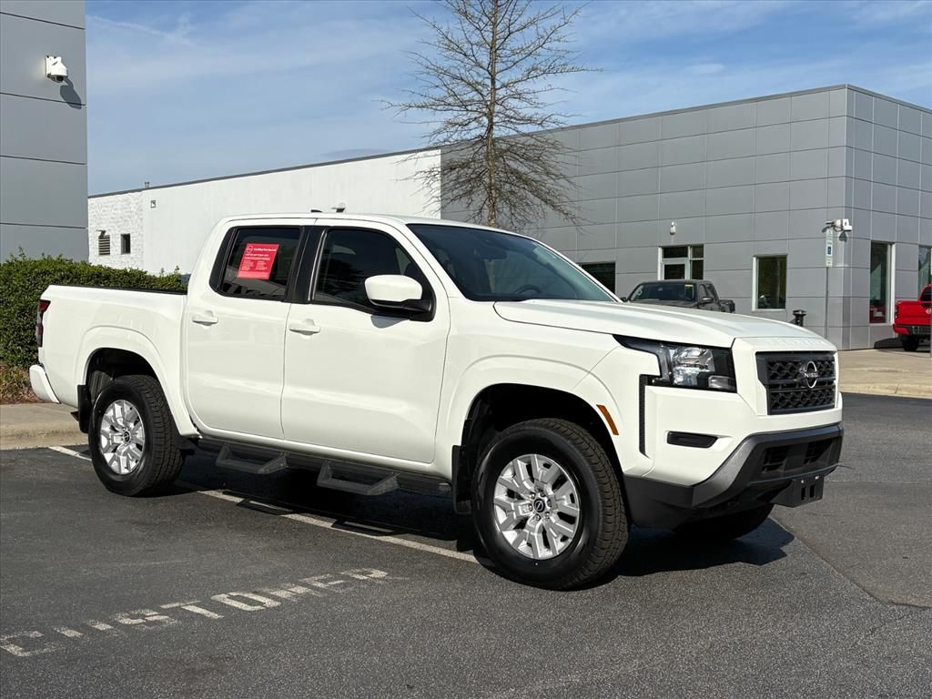 Glacier White 2023 Nissan Frontier SV Crew Cab 4WD Pickup Truck Four-Wheel Drive 9-Speed Automatic