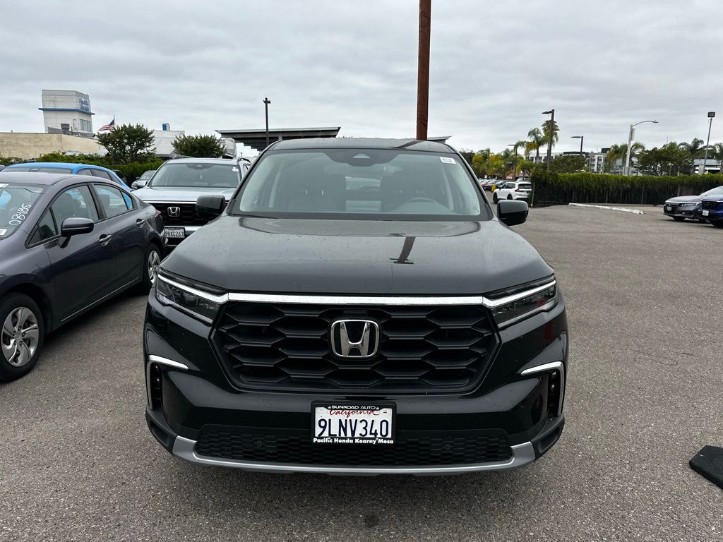 View vehicle photo 3