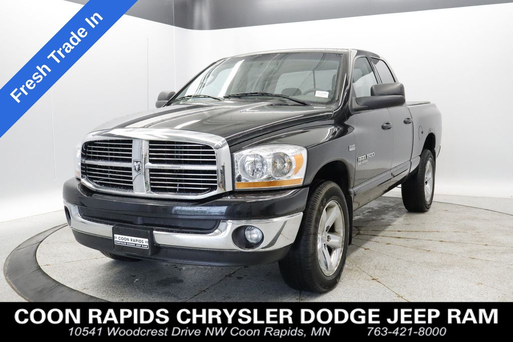 Brilliant Black Crystal Pearl 2006 Dodge RAM 1500 SLT Quad Cab 4WD Pickup Truck Four-Wheel Drive 5-Speed Automatic