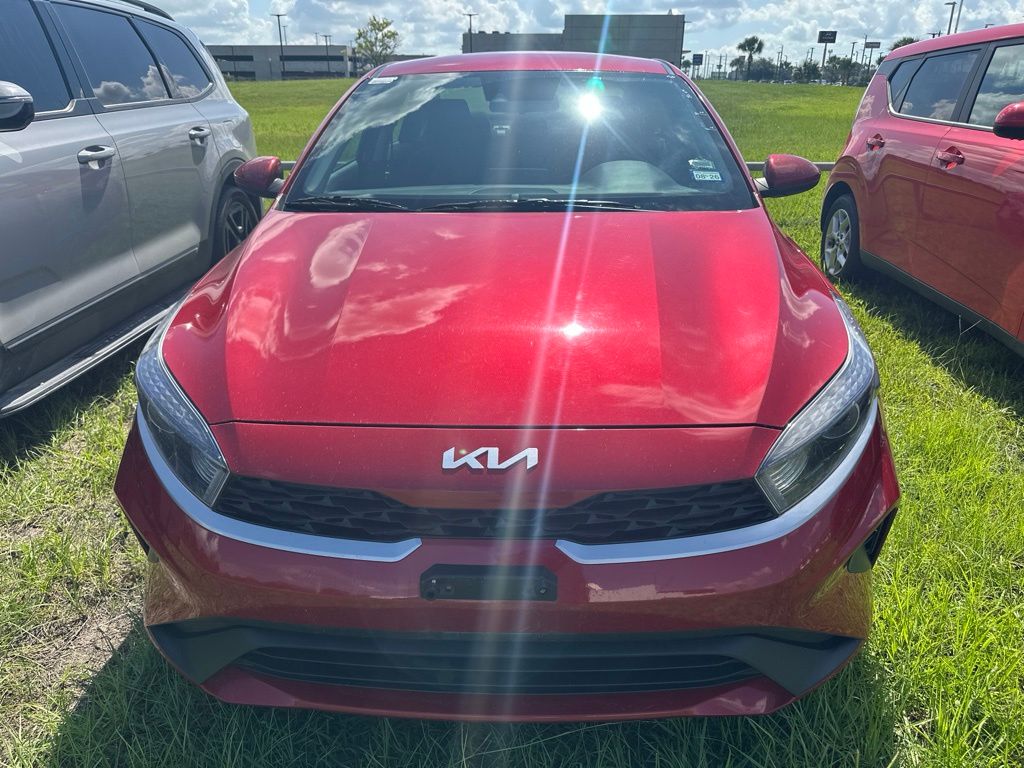2024 Kia Forte LXS Red at DeMontrond Auto Country