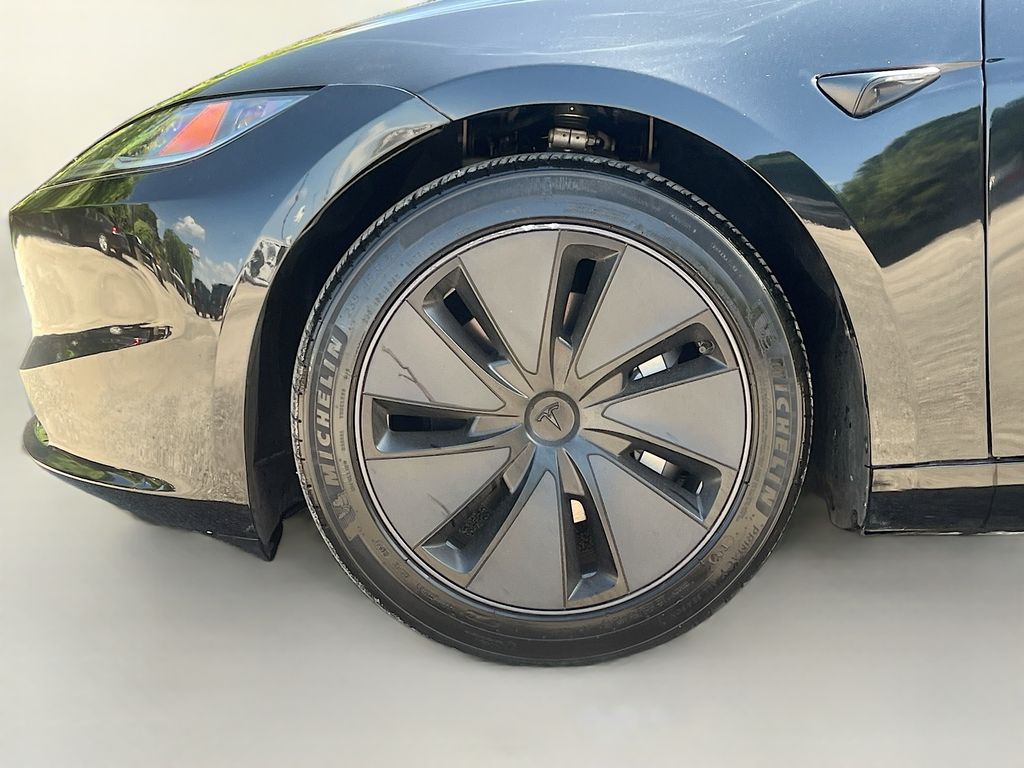 2025 Tesla Model 3 Long Range Black at AutoSavvy Houston Northwest