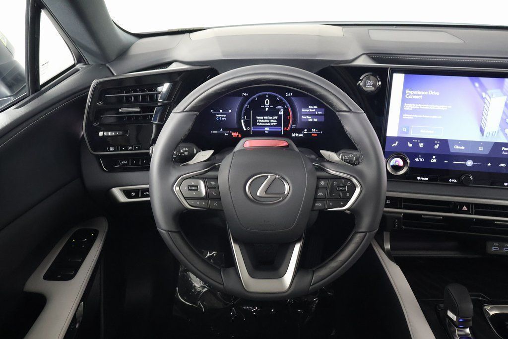 View vehicle photo 3