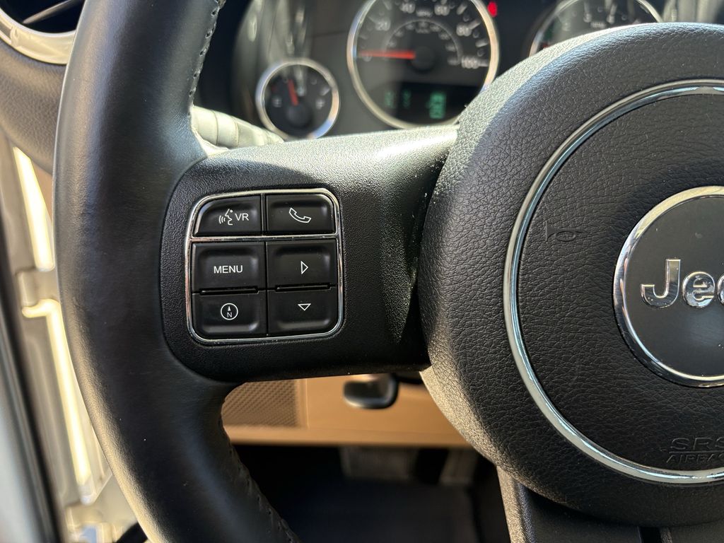 2014 Jeep Wrangler Unlimited Sahara White at Autostrade