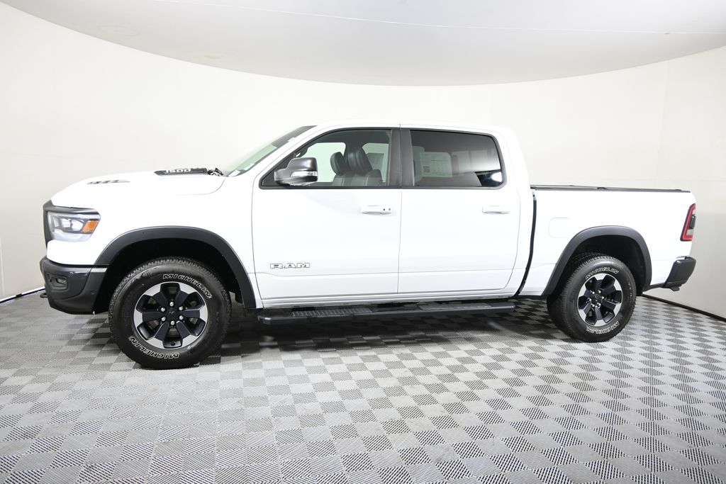 Used 2021 RAM Ram 1500 Rebel with VIN 1C6SRFLT2MN552865 for sale in Forest Lake, Minnesota