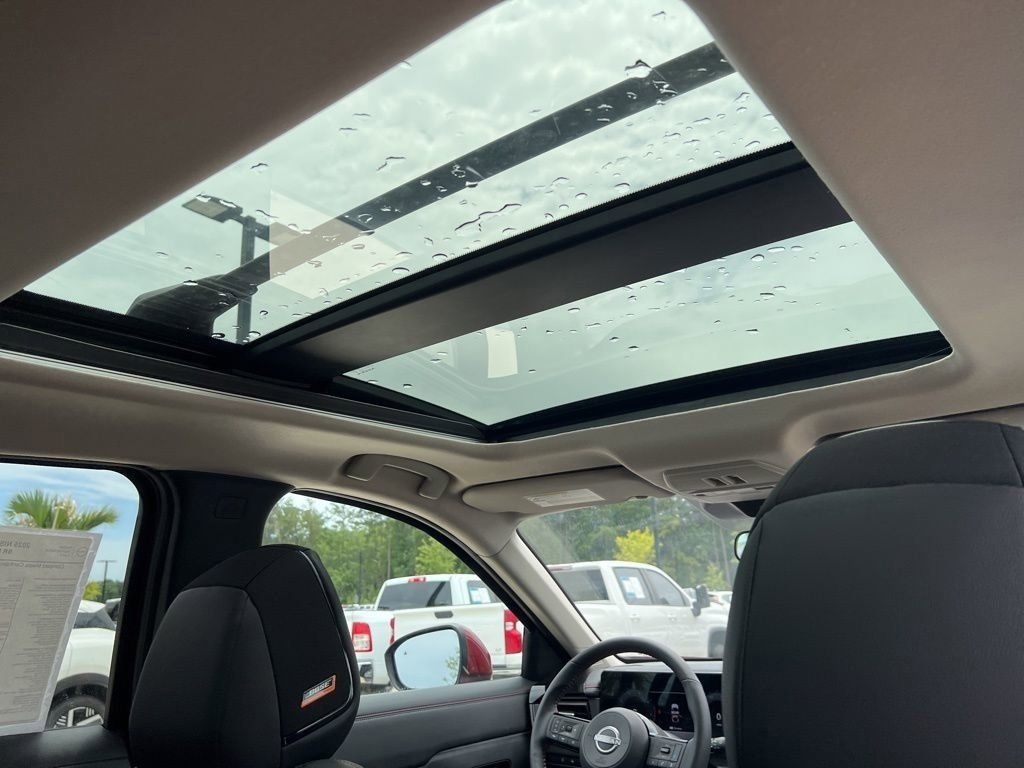 2025 Scarlet Ember Tintcoat Nissan Kicks SR FWD SUV