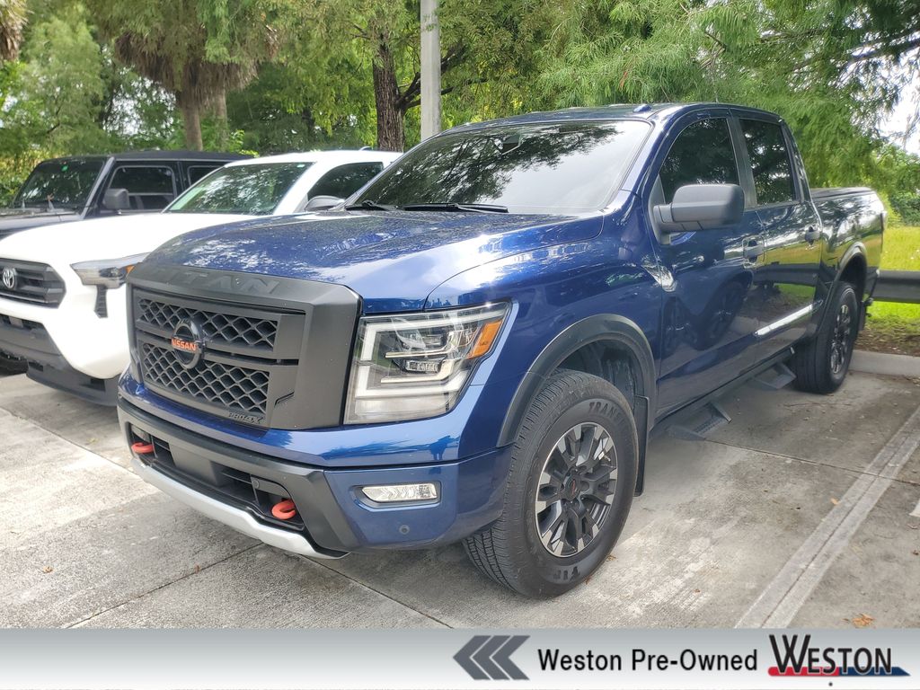 Deep Blue Pearl Metallic 2021 Nissan Titan Pickup Truck Four-Wheel Drive 9-Speed Automatic