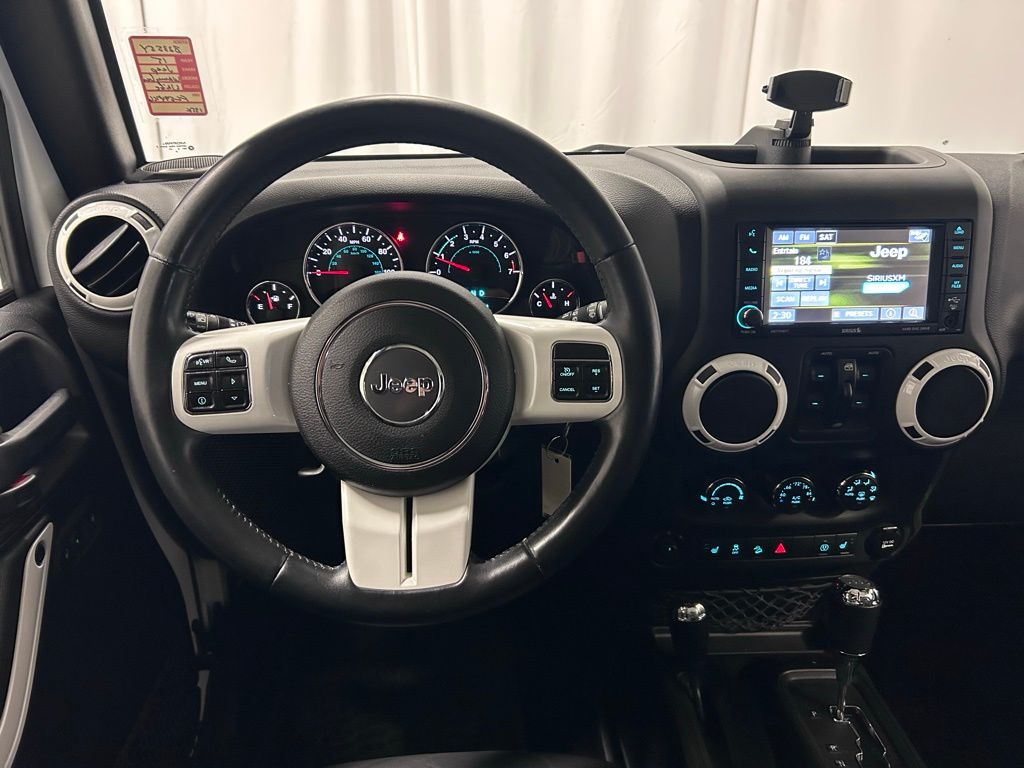 used 2015 Jeep Wrangler car, priced at $16,299