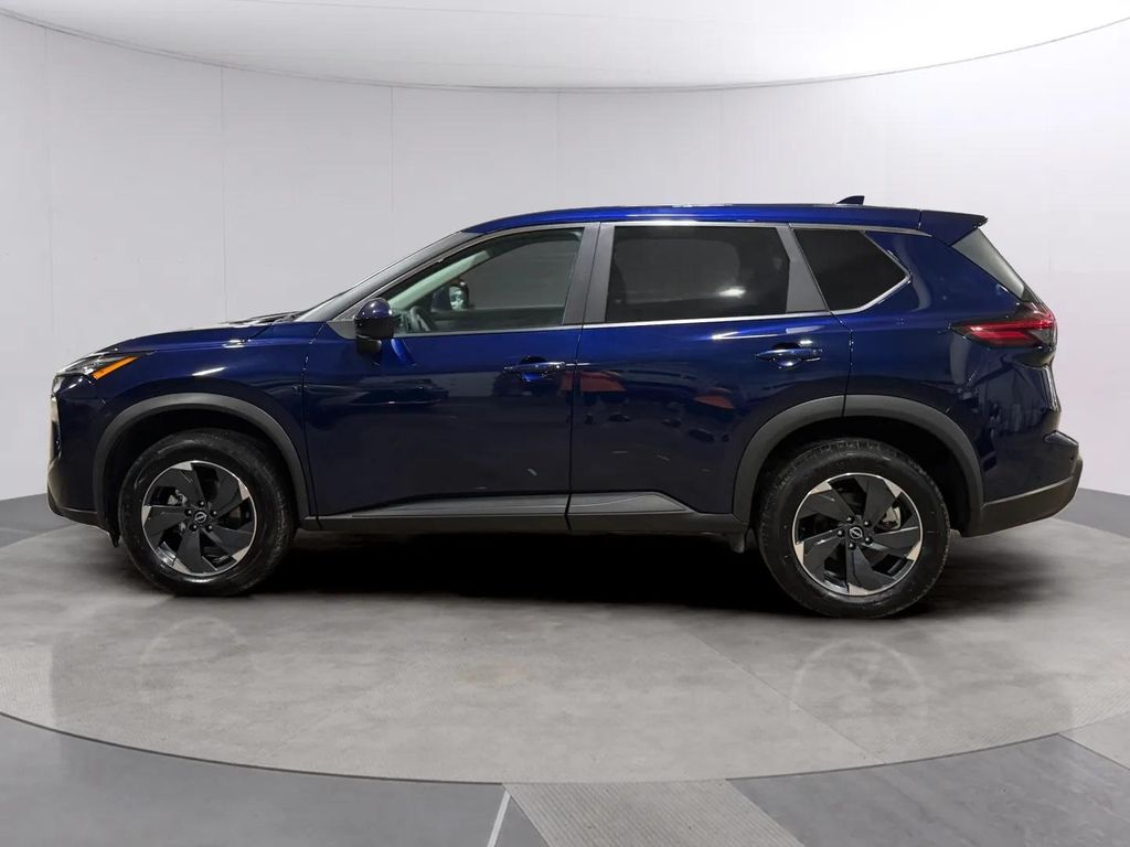 Certified Used 2024 Deep Ocean Blue Pearl Nissan SV image 7
