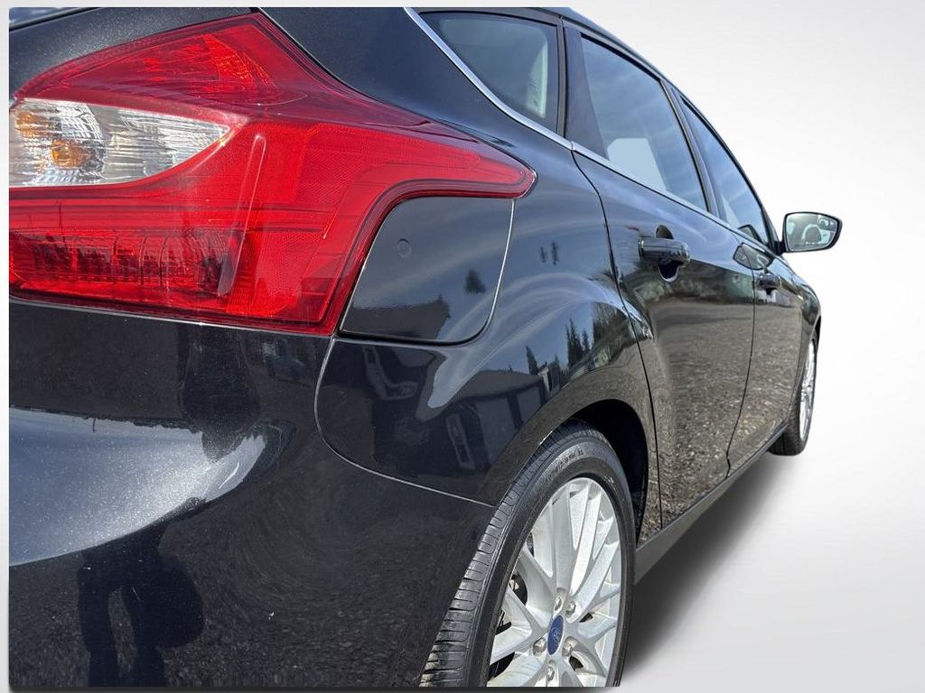 2014 Tuxedo Black Metallic Ford Focus Titanium FWD Hatchback