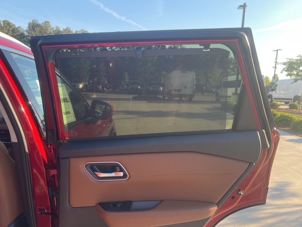 2025 Scarlet Ember Tintcoat Nissan Rogue Platinum FWD SUV