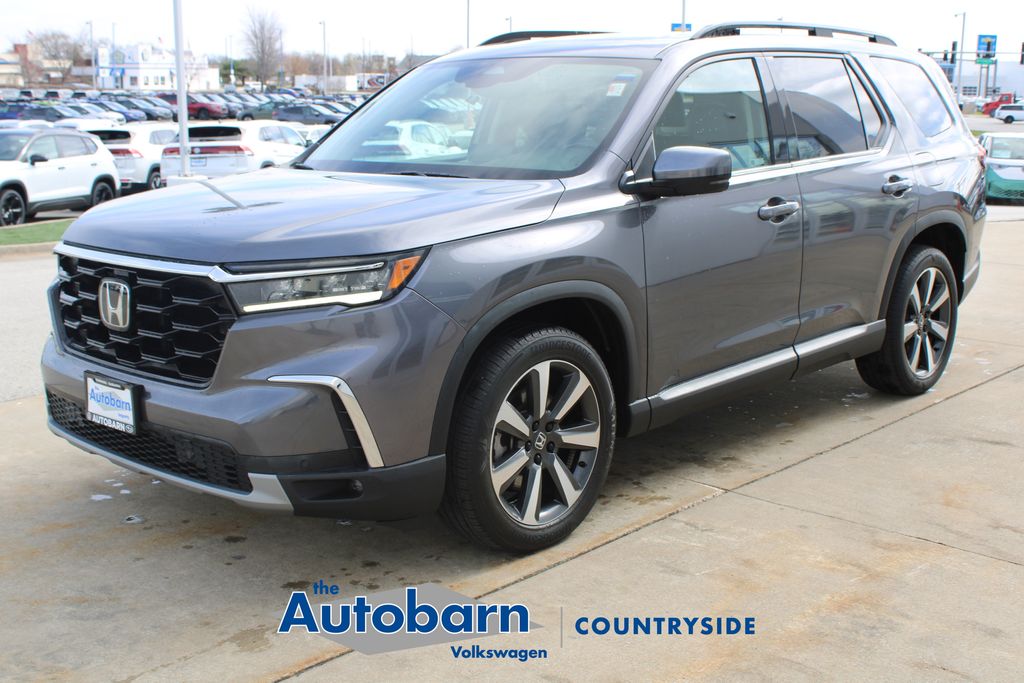 View vehicle photo 3