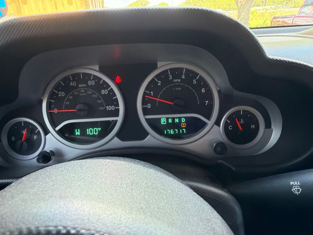 Used 2008 Red Jeep Unlimited Sahara image 13