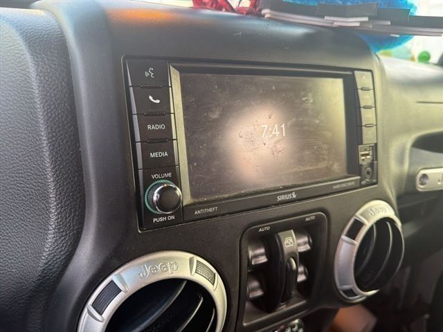 2013 Jeep Wrangler Unlimited Sahara Silver at Emmons Autoplex