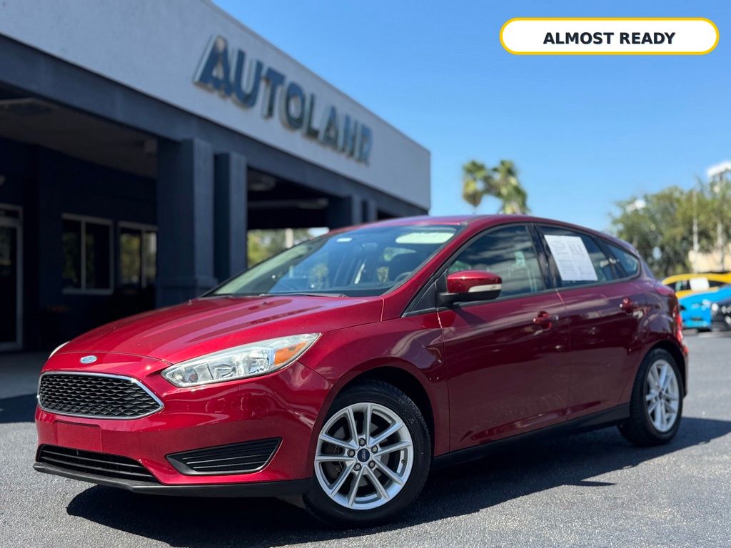 Ruby Red Metallic 2015 Ford Focus Hatchback Front-Wheel Drive 6-Speed Automatic