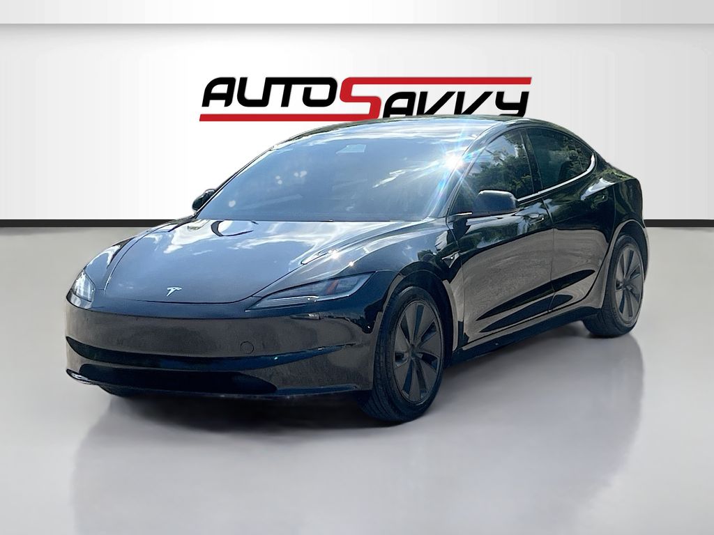 2025 Tesla Model 3 Long Range Black at AutoSavvy Houston Northwest