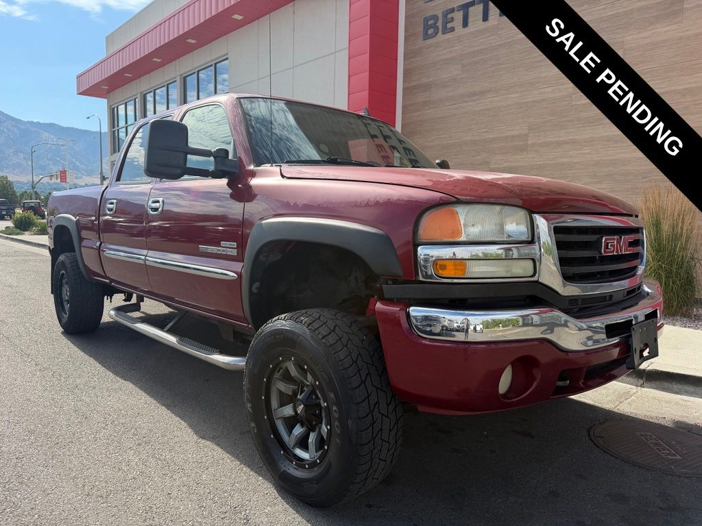 Sport Red Metallic 2006 GMC Sierra 2500HD Pickup Truck Four-Wheel Drive 6-Speed Automatic