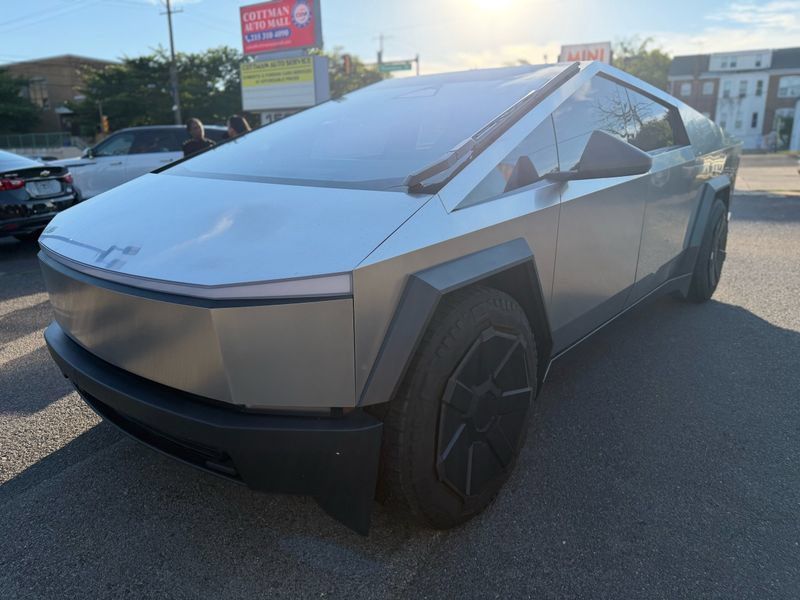 Silver 2024 Tesla Cybertruck Pickup Truck All-Wheel Drive 1-Speed Automatic