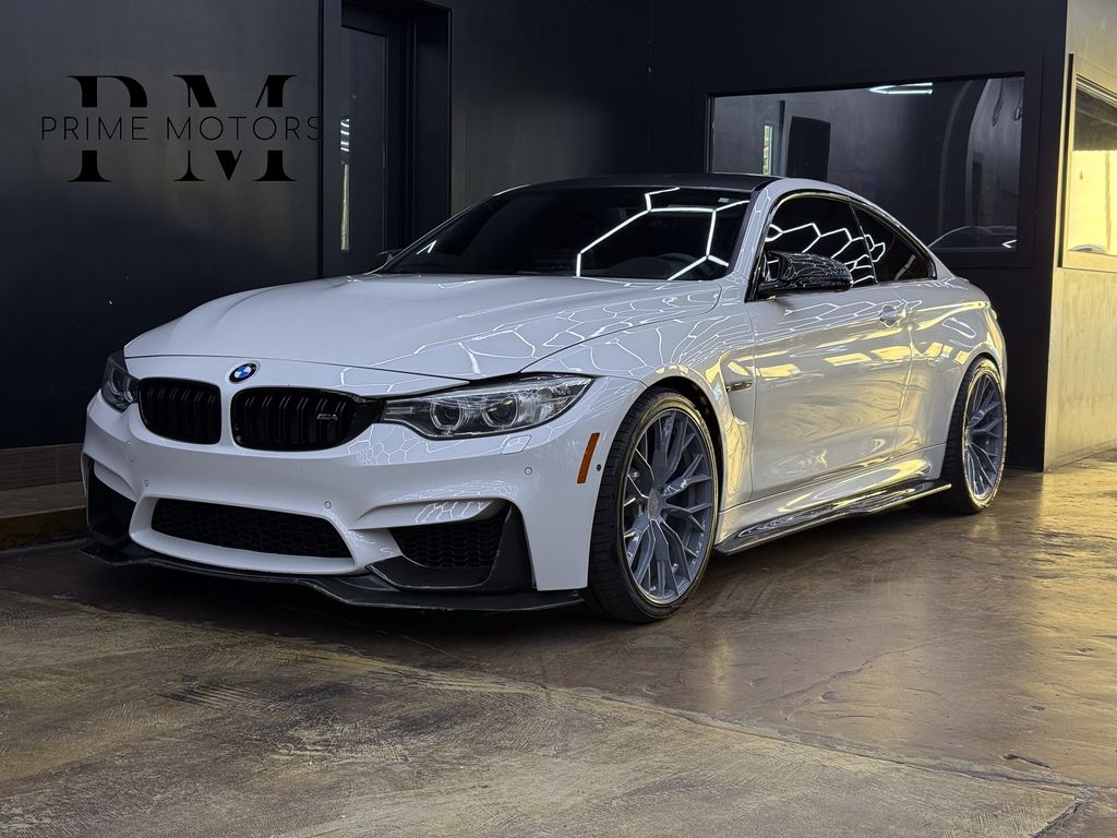 White Metallic 2016 BMW M4 Coupe RWD Coupe Rear-Wheel Drive 6-Speed Manual