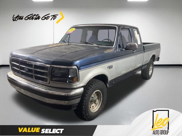 Blue / Silver 1993 Ford F-150 XL 4WD Extended Cab SB Pickup Truck Four-Wheel Drive 4-Speed Automatic